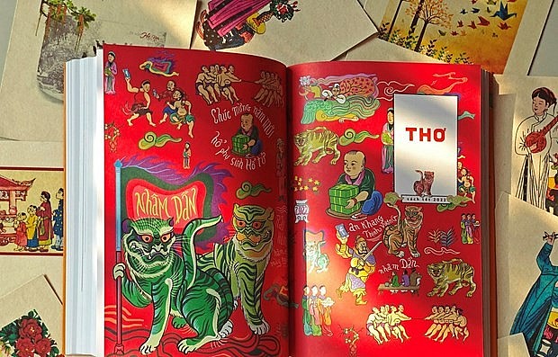 Colourful books feature traditional Tet have been published ahead of the festival. Photo: VNA