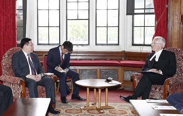 National Assembly Chairman Vương Đình Huệ with Speaker of the House of Lords John Mcfall in London on Wednesday. 