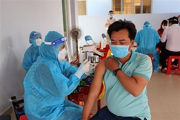 A resident in Tien Giang province gets vaccinated against Covid-19. Photo: VNA