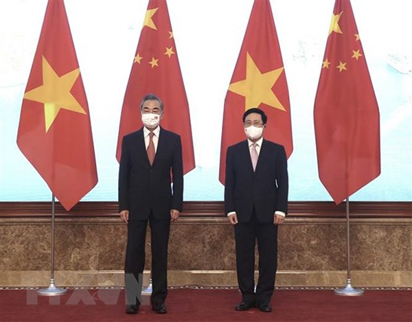 Standing Deputy Prime Minister Pham Binh Minh welcomed Chinese State Councilor and Foreign Minister Wang Yi to attend the 13th meeting of the Steering Committee for Bilateral Cooperation between Vietnam and China in September 2021 in Hanoi. Photo: Lam Khanh/VNA