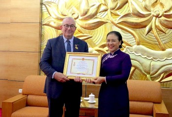 Outgoing Belgium Ambassador Receives VUFO's Insignia for Peace and Friendship