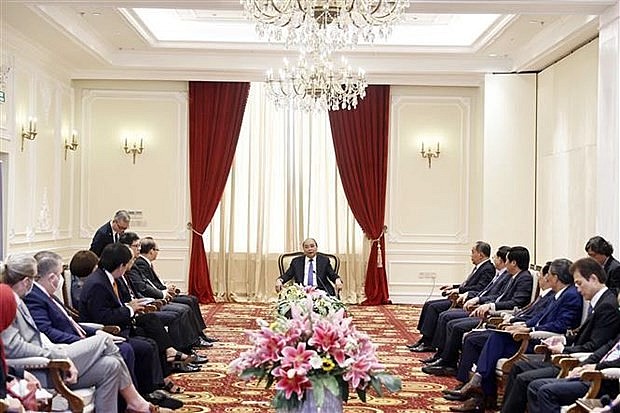 President Phuc meets with the ABAC delegation. (Photo: VNA)
