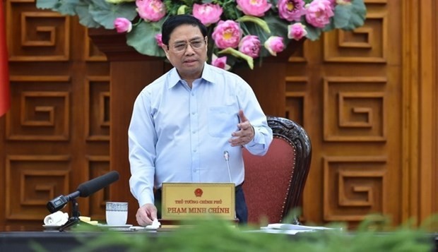 Prime Minister Pham Minh Chinh speaks at the meeting. (Photo: baochinhphu.vn)