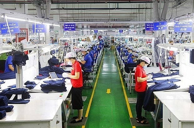 Workers make garment products at Apparel Far Eastern Vietnam Co. in Binh Duong province. Photo: VNA