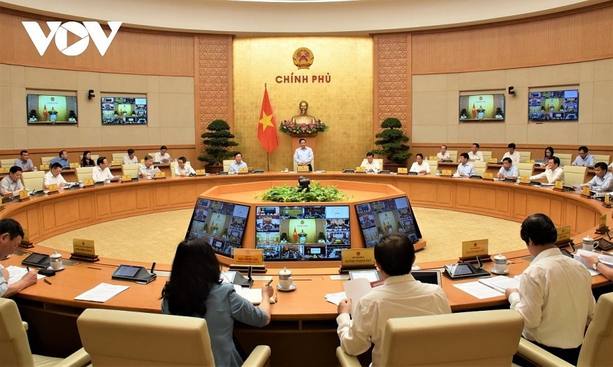 PM Pham Minh Chinh presides over the Cabinet meeting for July in Hanoi on August 3.