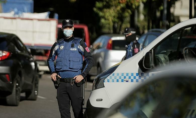 Cops stand guard in Madrid, Spain, October 3, 2020. Picture by Reuters/Javier Barbancho