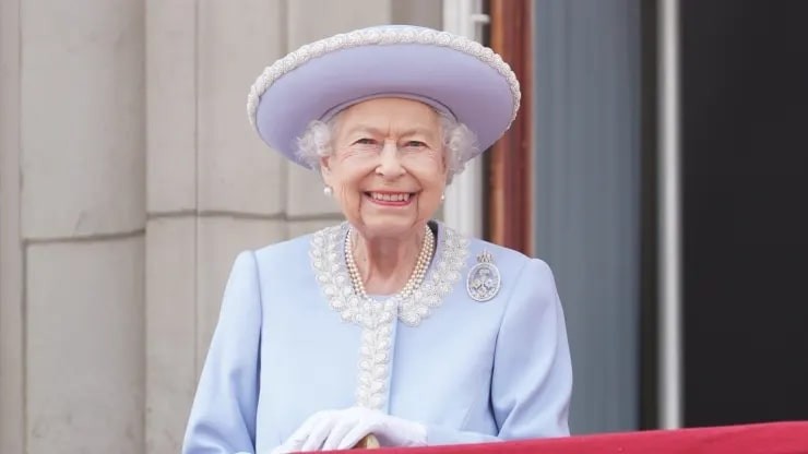 Queen Elizabeth II watches from the balcony of Buckingham Palace during the Trooping the Colour parade the Trooping the Colour parade on June 2, 2022 in London, England. Wpa Pool | Getty Images