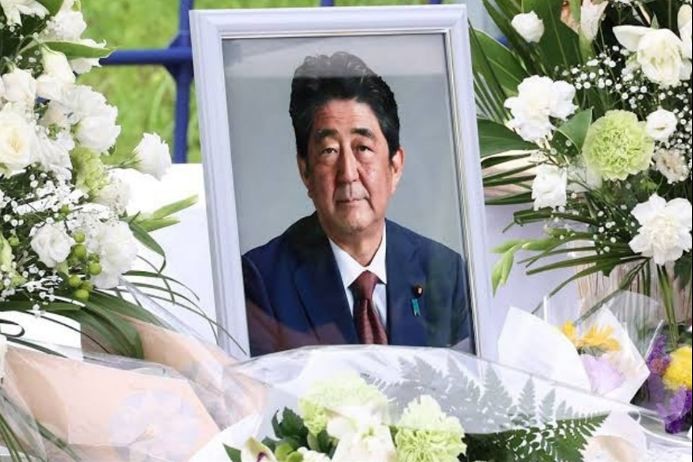 A picture of late former Japanese Prime Minister Shinzo Abe, who was shot while campaigning for a parliamentary election, is seen at Headquarters of the Japanese Liberal Democratic Party in Tokyo, Japan July 12, 2022. REUTERS/Kim Kyung-Hoon/File Photo