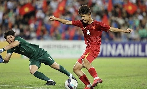 Long Vu (in red) scored the second goal for Vietnam. Photo: VNA