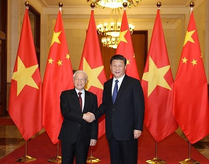 CPV General Secretary Nguyen Phu Trong (L) and CPC General Secretary and President Xi Jinping (Photo: VNA)