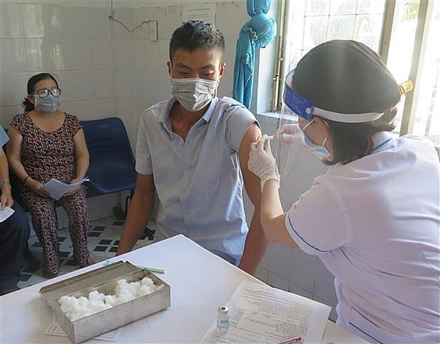 More than 261.81 million doses of COVID-19 vaccines have been administered so far. Photo: VNA