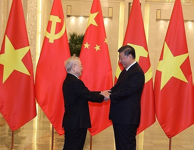 Party General Secretary Nguyen Phu Trong (L) and Party General Secretary and President of China Xi Jinping (Photo: VNA)