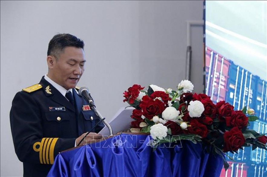Senior Lieutenant Colonel Bui Van Quy, deputy general director of Saigon Newport Corporation (SNP), addresses the event. Photo: VNA