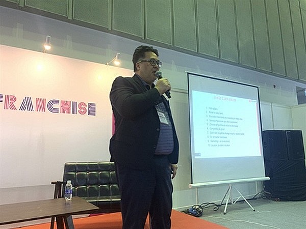 Sean Ngo, a speaker at a conference on franchising held at the 2022 Vietnam Retail-Tech and Franchise Expo. 