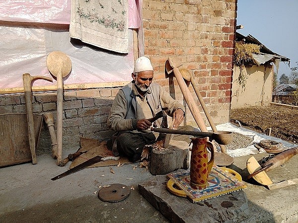 This Carpenter in Budgam Famous For Making Wooden Kitchenware