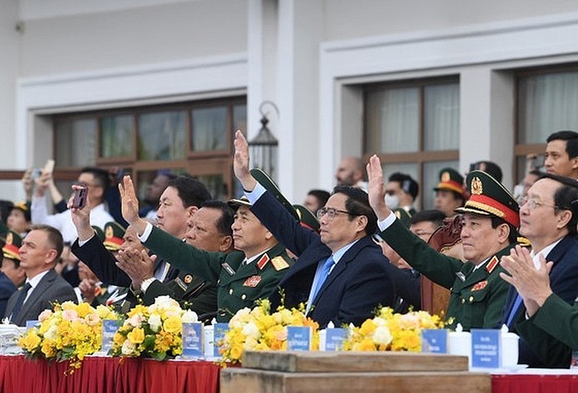 Vietnamese Prime Minister Pham Minh Chinh along with senior leaders enjoy the performances. 