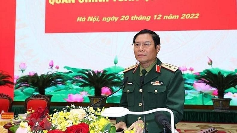 Senior Lieutenant General Nguyen Tan Cuong, Chief of the General Staff of the Vietnam People's Army, delivers a report at the conference. (Photo: VNA)