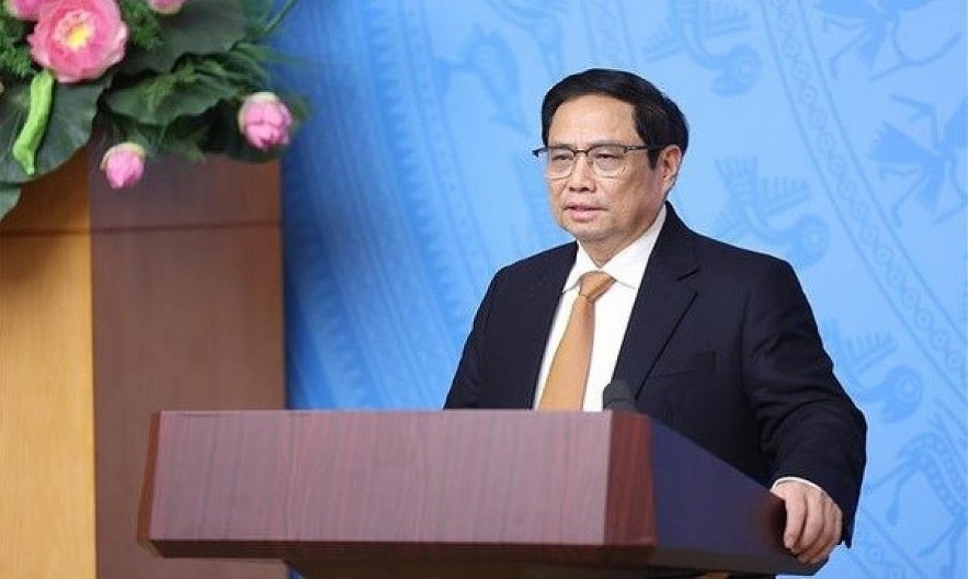 Prime Minister Pham Minh Chinh addresses the meeting. Photo: VNA