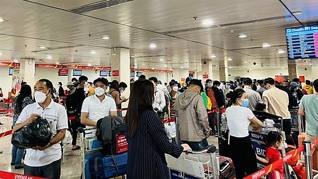 Tan Son Nhat International Airport in HCM City is overrun by air travelers. Photo: VNA