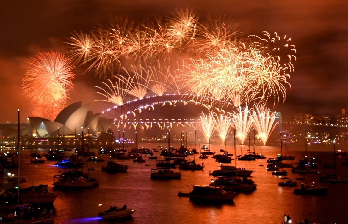 Fireworks explode over Sydney Harbour during the New Year's Eve celebrations in the Australian city. [Jaimi Joy/Reuters]