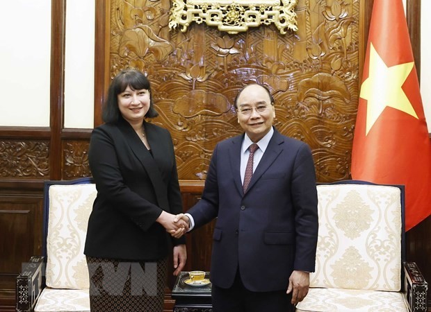 President Nguyen Xuan Phuc (R) and Romanian Ambassador Cristina Romila. Photo: VNA
