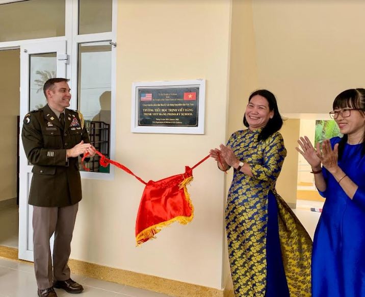 Delegates from both governments participates in the ribbon-cutting ceremony.