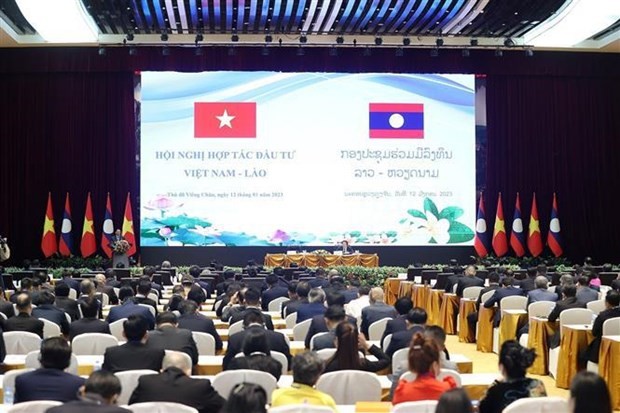 The Vietnam - Laos investment cooperation conference in Vientiane on January 12. Photo: VNA
