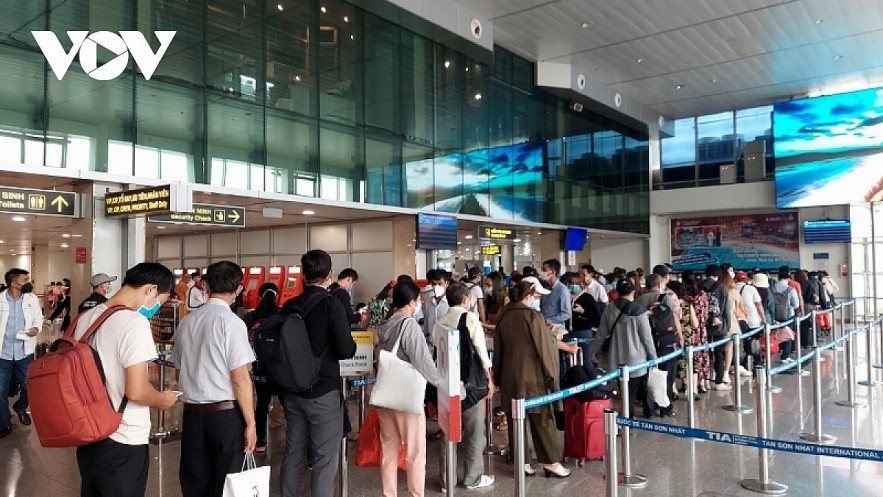 Tan Son Nhat International Airport in Ho Chi Minh City, the largest in Vietnam, is crowded with people travelling home for Tet celebrations.