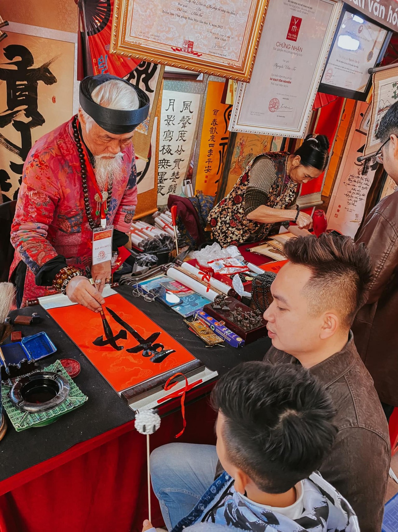 Seeking calligraphy works of lucky words is among the elegant hobbies of Vietnamese people during the traditional Lunar New Year (Tet) holiday