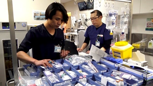 A Vietnamese man working as caregiver at Japan’s Saitama Medical University Hospital. Photo: VietnamPlus