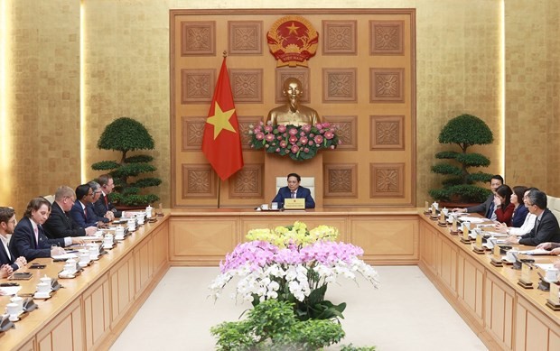 The foreign-invested economic sector is an important component of Vietnam's economy and the Vietnamese Government always protects the legitimate and legitimate rights and interests of investors, Prime Minister Pham Minh Chinh said on February 14. Photo: VNA