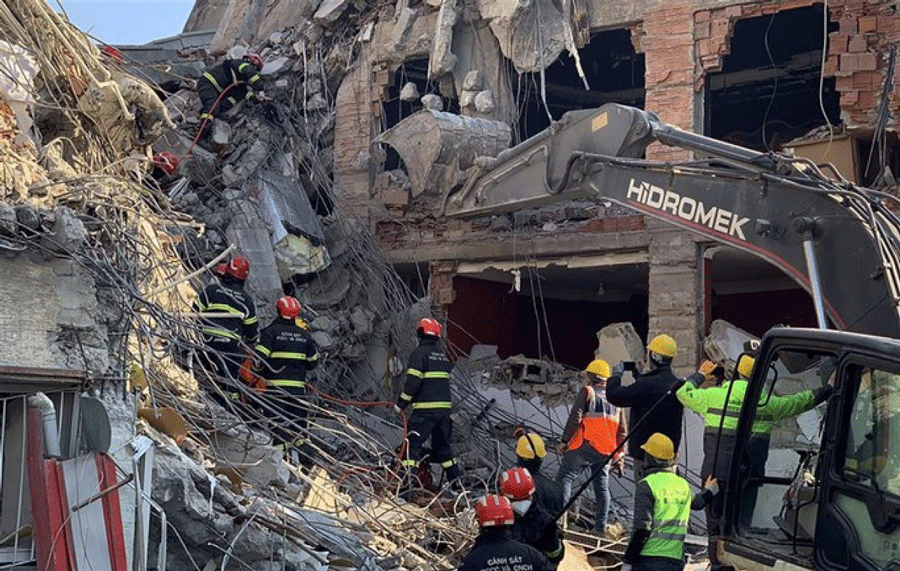 Vietnamese rescue workers undertake their mission at a site devastated by the earthquake in Turkey.