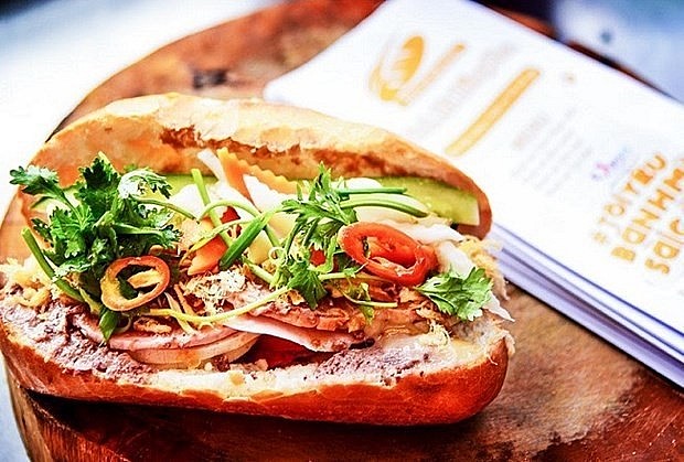 Bánh mì (pronounced 'bun mee') is a popular Vietnamese variety of sandwiches that share the same core ingredient a baguette. (Photo: VNA)
