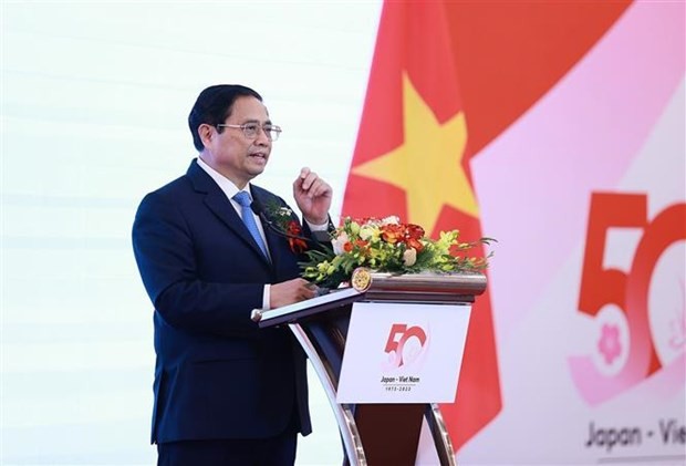 PM Pham Minh Chinh addresses the high-level economic seminar in Hanoi on March 7. Photo: VNA