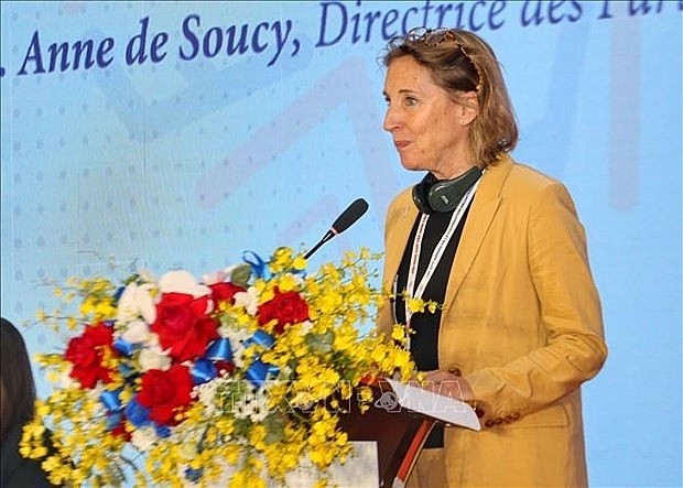 Anne de Soucy, Director of Partnerships at the French Development Agency ADF, speaks at the event. (Photo: VNA)