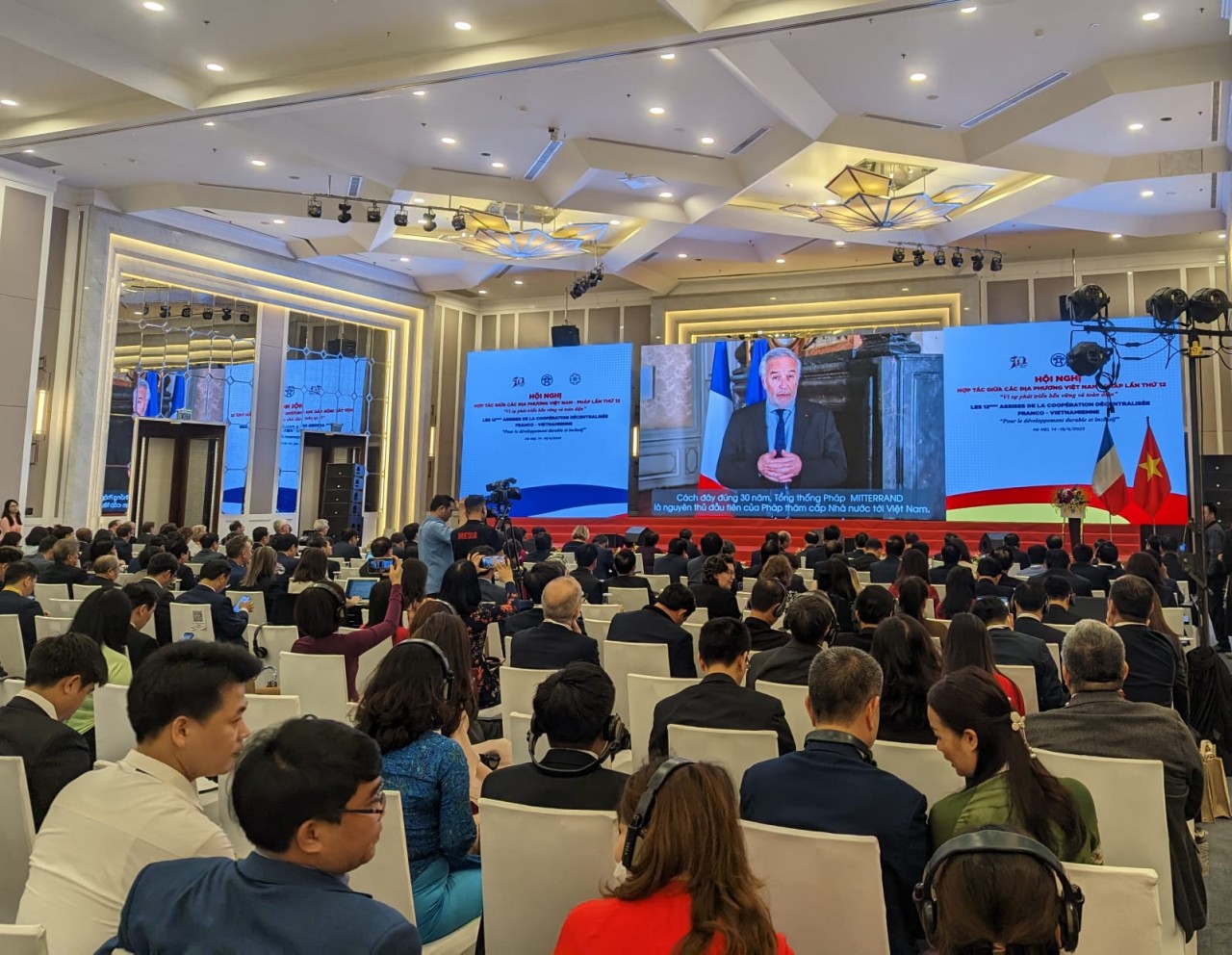 at the opening of the 12th Vietnam-France decentralised cooperation conference in the capital city on April 14. Photo: VNA
