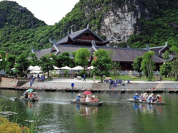Trang An scenic landscape complex in the northern province of Ninh Binh. After three years of stagnation due to the COVID-19 pandemic, Vietnam's tourism industry is accelerating its recovery. (Photo: VNA)