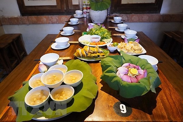 Duong Lam Ancient Village's Cuisine Attracts International Tourists