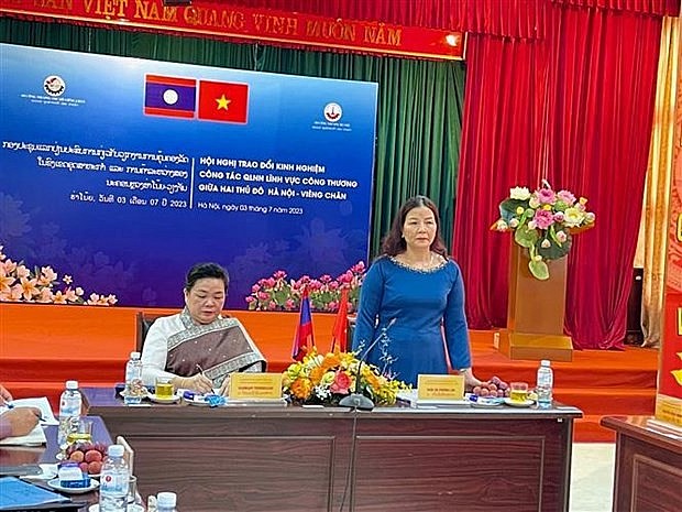Acting Director of the Hanoi Department of Industry and Trade Tran Thi Phuong Lan speaks at the event (Photo: VNA)