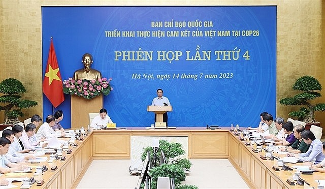 Prime Minister Phạm Minh Chính (centre) chaired the national COP26 steering committee meeting on Friday afternoon. — VNA/VNS Photo Dương Giang