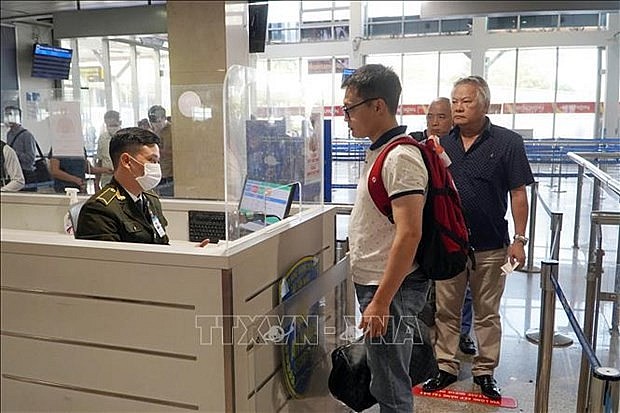 At a security check desk in Tan Son Nhat International Airport (Photo: VNA)