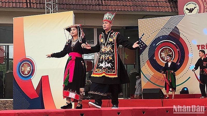 Performance of national costumes at the Vietnam National Village for Ethnic Culture and Tourism.