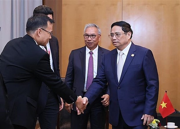 Prime Minister Pham Minh Chinh receives representatives of Indonesian enterprises. (Photo: VNA)