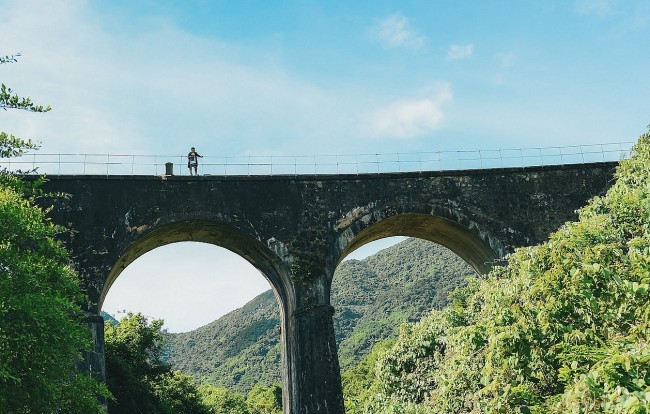 Explore The Unique Don Ca Arch Bridge In Hai Van Pass