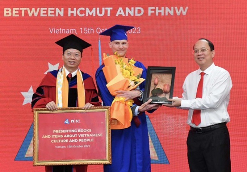 ho chi minh city presented vietnam bookcase to swiss university
