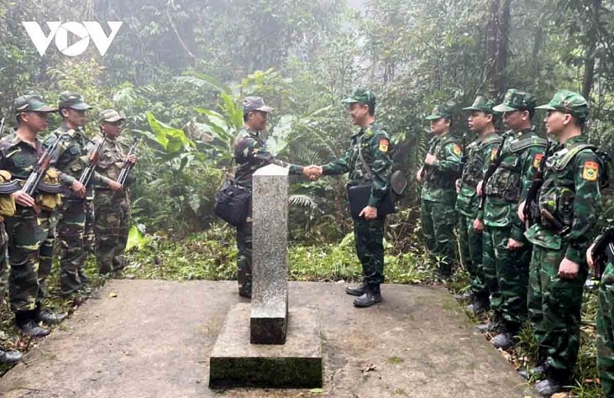 Border guards of Vietnam and Laos hold a joint patrol along their shared border.