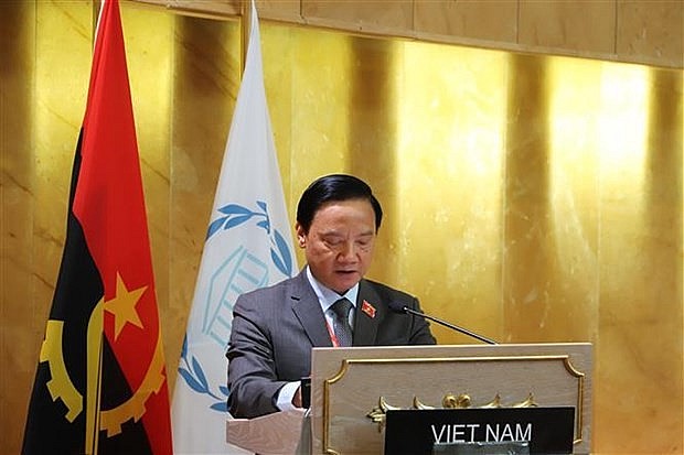 Deputy Chairman of the National Assembly (NA) Nguyen Khac Dinh speaks at the event. (Photo: VNA)