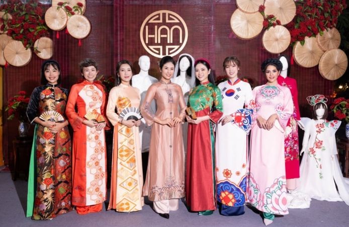 Artists, ambassadors bringing back “ao dai” for men