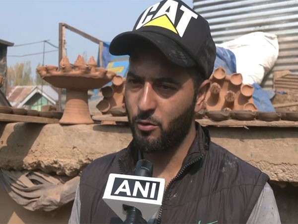 Young Kashmiri Muslim potter prepares thousands of lamps ahead of Diwali