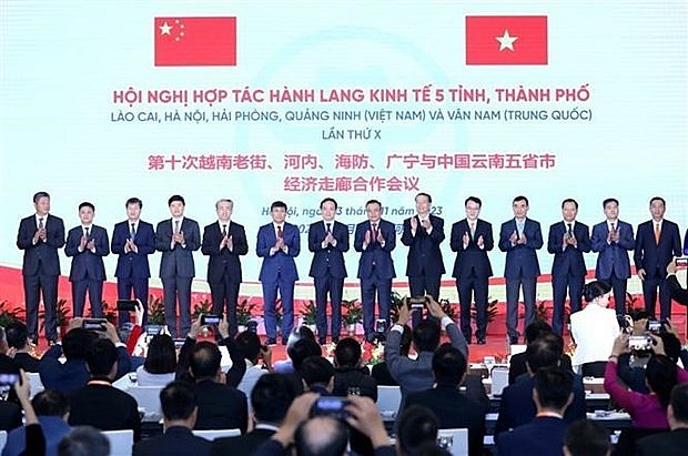 Delegates to the opening of the conference on economic corridor cooperation involving Lao Cai, Hanoi, Hai Phong, Quang Ninh of Vietnam and China’s Yunnan province, held in Hanoi on November 13. (Photo: VNA)